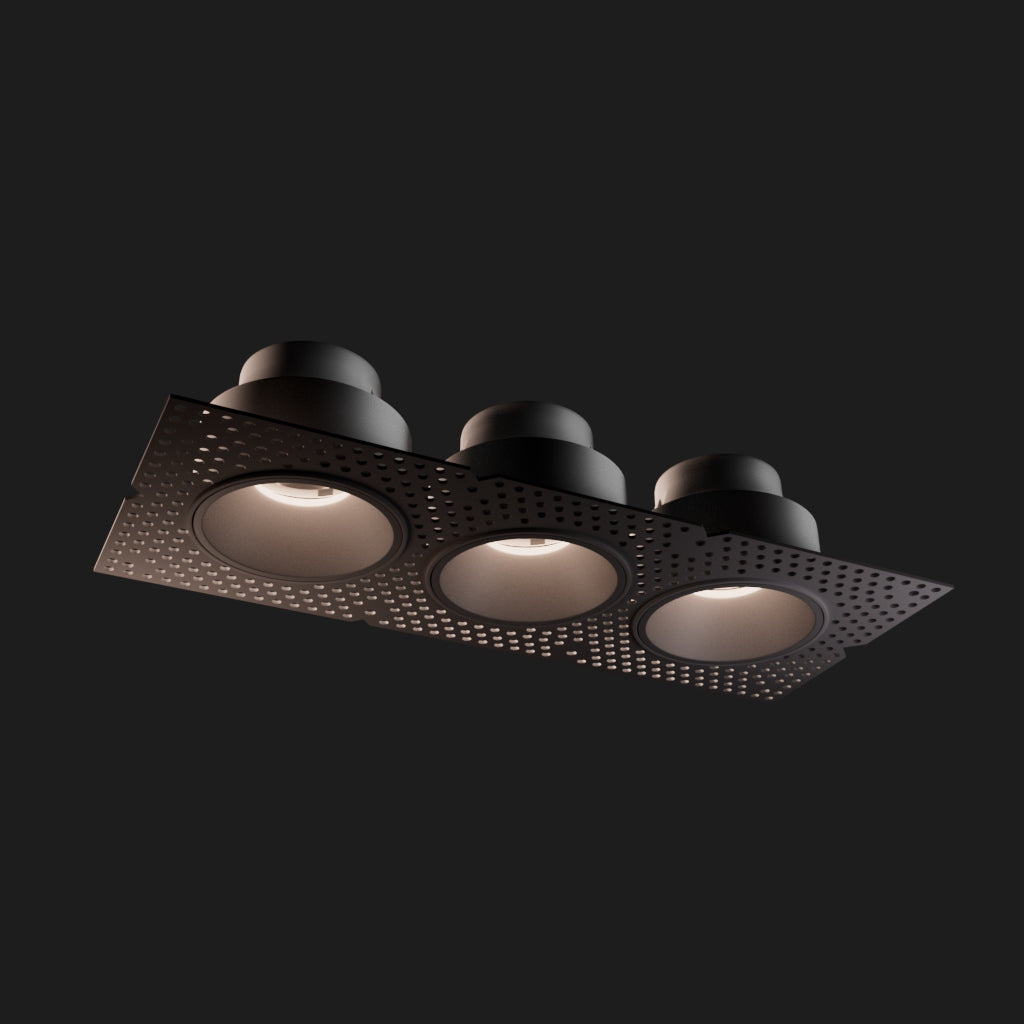 Triple modern ceiling downlight on a black background