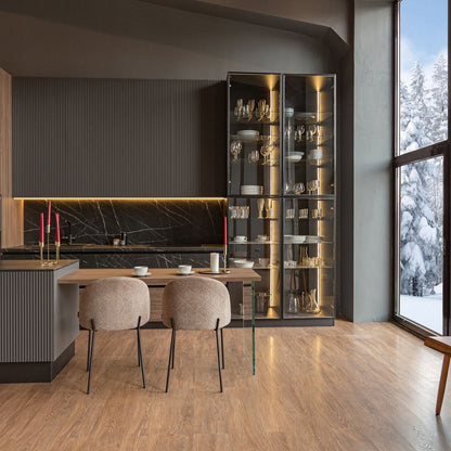 Modern kitchen with wooden floor, large window, and glass cabinet.